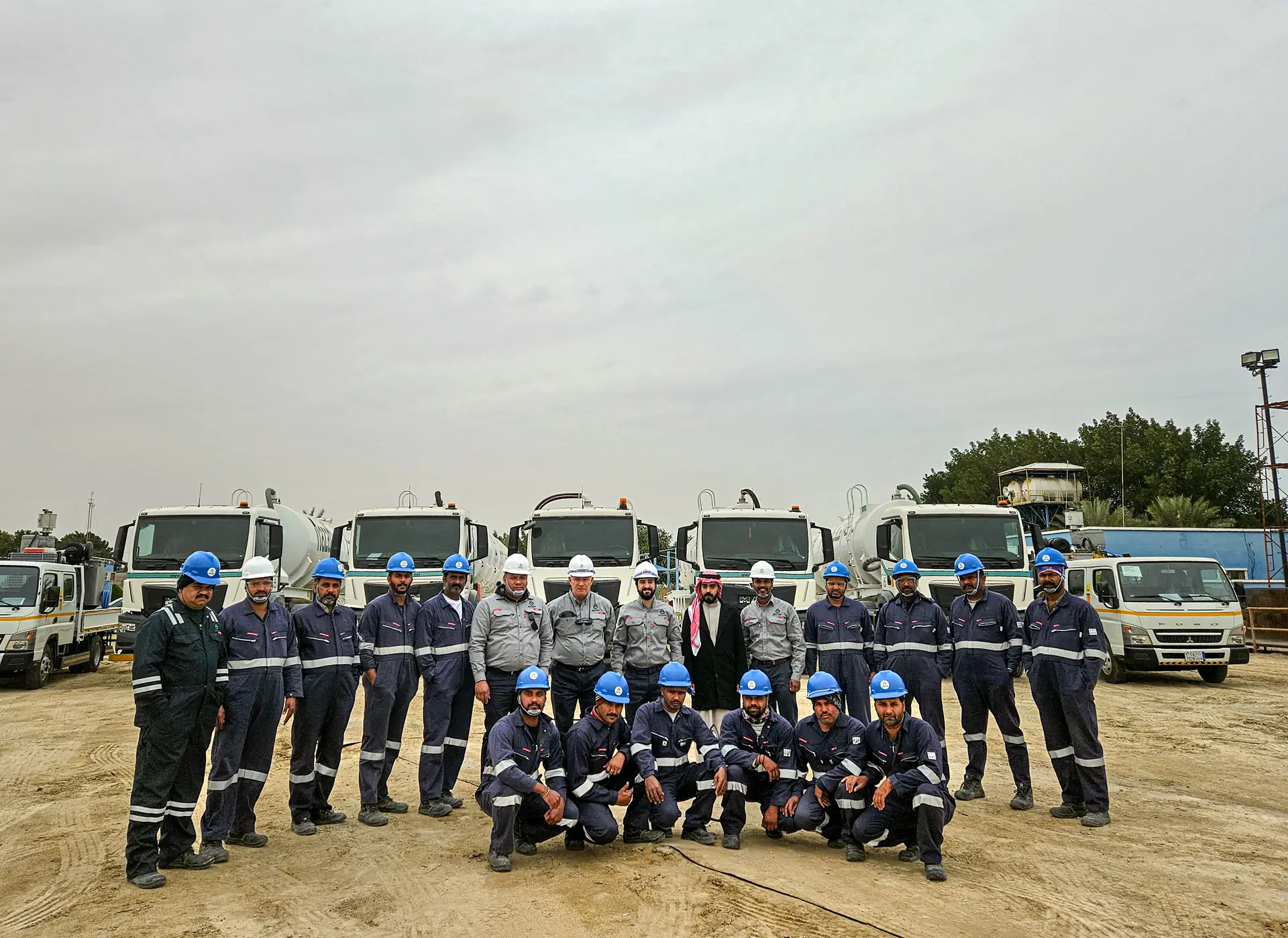 Nazafa operations team with industrial service vehicles